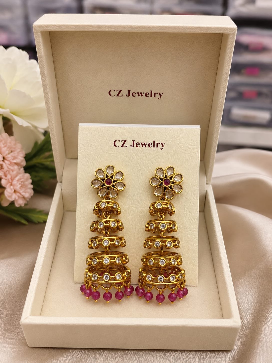 1 Gram Gold-Plated CZ Flower Jhumka Earrings with Pink Beads